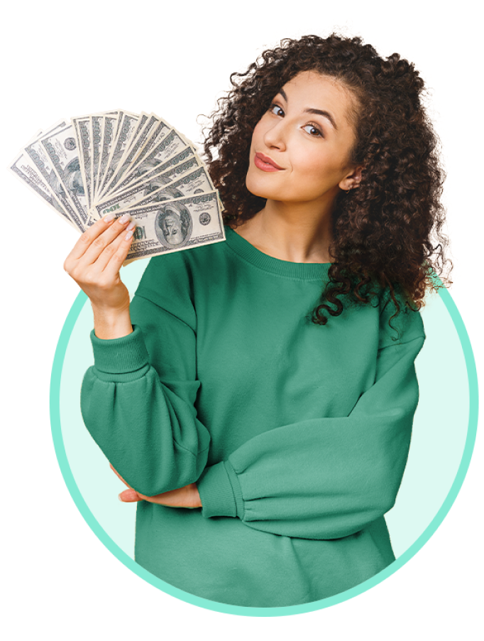 Young woman holding money