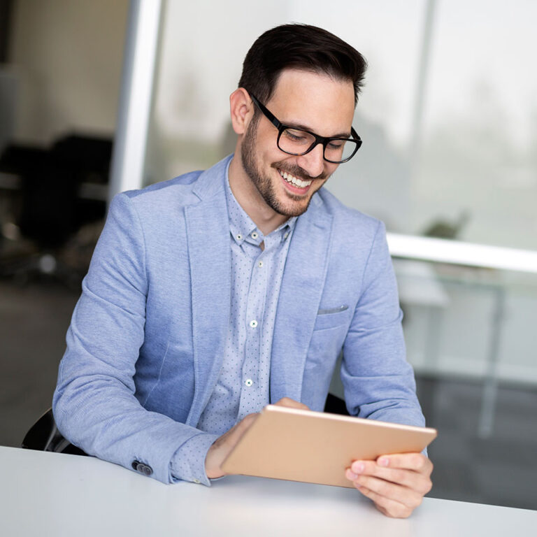 Businessman using a tablet.