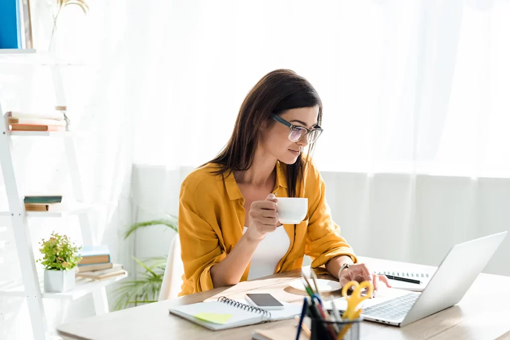 young woman checking how taxes affect credit score