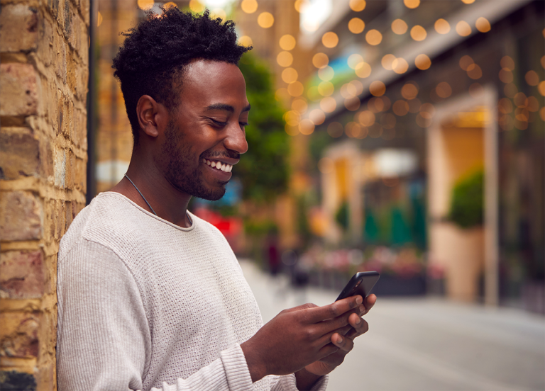 man looking at phone